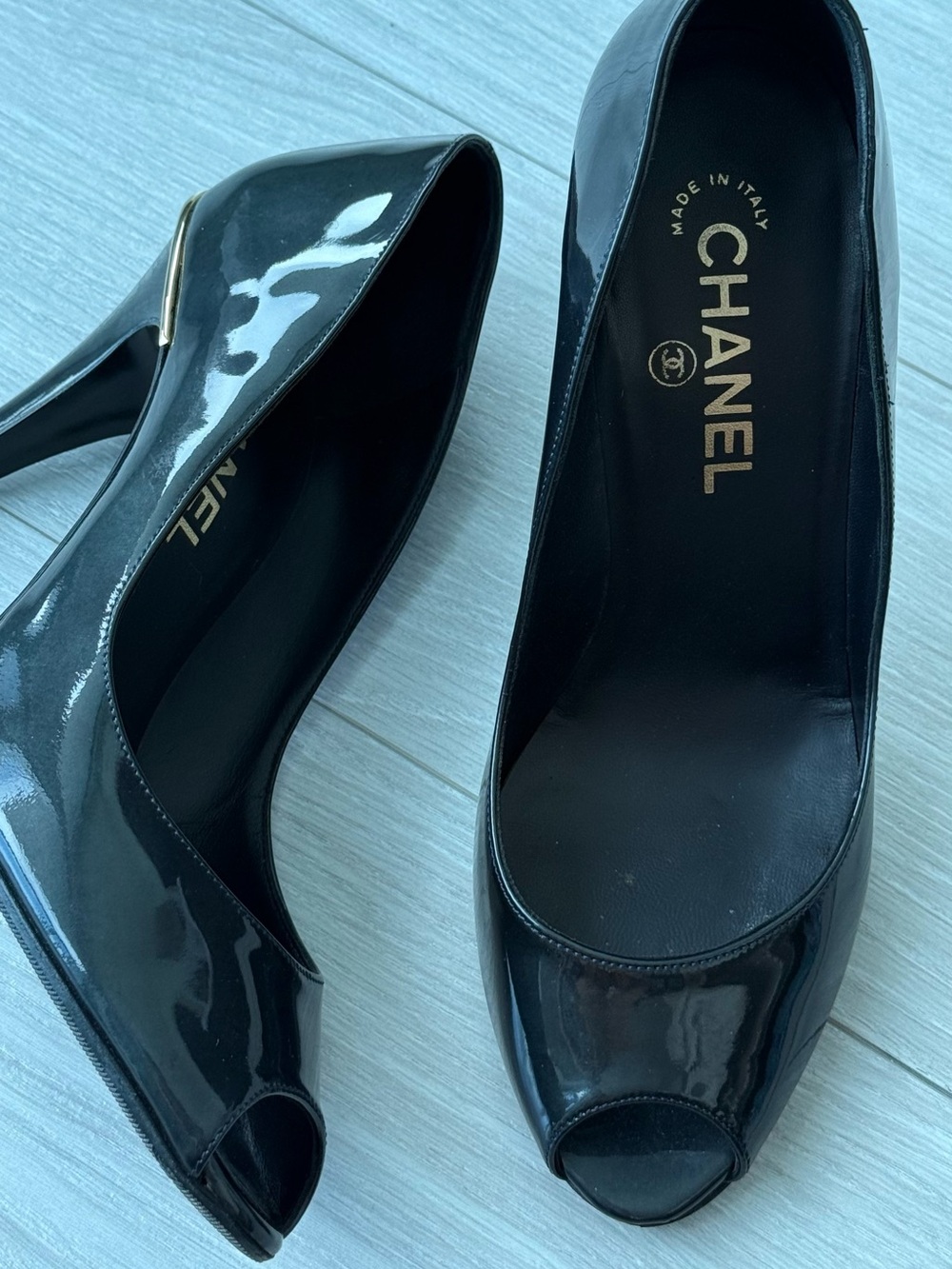 CHANEL Black Patent Leather Peep-Toe Heels with Gold Accent